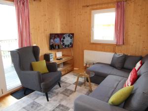 Telewizja i/lub zestaw kina domowego w obiekcie Chalet Klippitzrose by Interhome