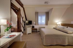 Postel nebo postele na pokoji v ubytování Hotel Hoeri am Bodensee