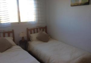 Posteľ alebo postele v izbe v ubytovaní Relax Inn + 7 fotografií