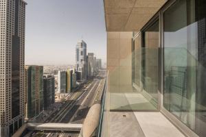 a view of a city from a building at GUEST READY - Luxury One Bedroom Apartment DIFC Burj Khalifa View in Dubai