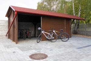 a group of bikes parked in a garage at Penzion Stará hora in Velké Pavlovice