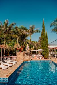 Piscina a Pousada Vilarejo de Minas o a prop