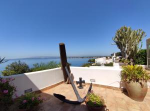 a view of the ocean from the patio of a house at La Rosa Sul Mare in Siracusa