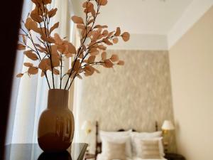 Posteľ alebo postele v izbe v ubytovaní OPERA16 Guestrooms + 37 fotografií
