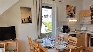 Kuchyň nebo kuchyňský kout v ubytování Ferienwohnung Nr 5 am Weststrand - 4 Sterne DTV