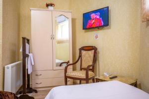 TV a/nebo společenská místnost v ubytování HOTEL VLADi