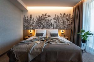 Voodi või voodid majutusasutuse Hotel HegiQ - Adults Only Hotel toas