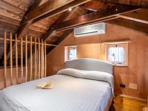 Postel nebo postele na pokoji v ubytování Holiday Home Sant'Evasio by Interhome