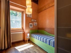 Postel nebo postele na pokoji v ubytování Holiday Home Sant'Evasio by Interhome