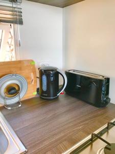 Mobil Home Vue sur Mer - Racine 03的咖啡和沏茶工具