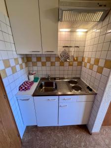 Kjøkken eller kjøkkenkrok på Pension Lambrecht