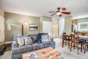 a living room with a couch and a table at Endless Weekend in Rockaway Beach