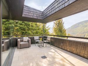 a balcony with a view of the mountains at Apartment Sunny by Interhome in Zell am See