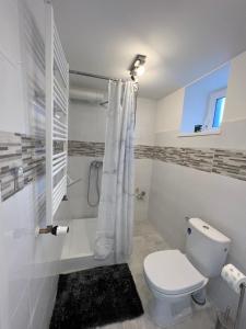 Ванна кімната в Apartament Połaniecka 1B/2