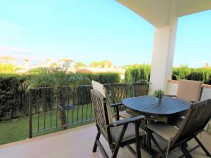 A balcony or terrace at Holiday Home Flor de Ponoig by Interhome