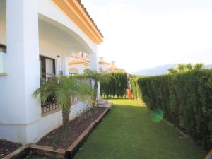 A garden outside Holiday Home Flor de Ponoig by Interhome
