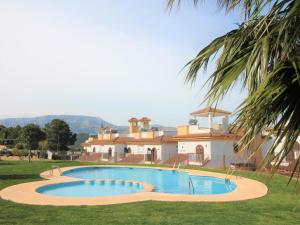 The swimming pool at or close to Holiday Home Flor de Ponoig by Interhome