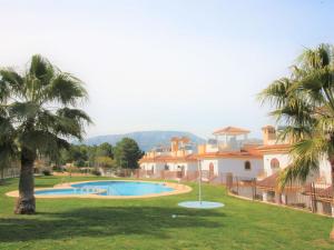 The swimming pool at or close to Holiday Home Flor de Ponoig by Interhome