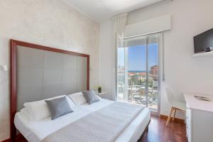 Postel nebo postele na pokoji v ubytování Hotel Imperiale + 37 fotografií