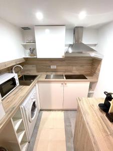 Kuchyňa alebo kuchynka v ubytovaní Loft Augustins