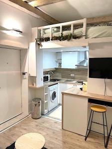 Kuchyňa alebo kuchynka v ubytovaní Loft Augustins
