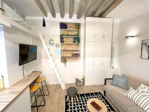 Posteľ alebo postele v izbe v ubytovaní Loft Augustins