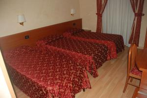 Postel nebo postele na pokoji v ubytování Funny Palace Hostel