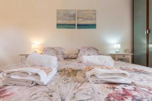 A bed or beds in a room at Villa Orquidea