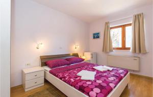 Ein Bett oder Betten in einem Zimmer der Unterkunft Gorgeous Home In Jadranovo With Kitchen