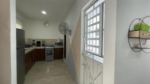 Kuchyň nebo kuchyňský kout v ubytování Departamento Orellana 11