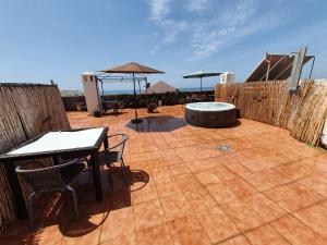 Patio lub wspólna przestrzeń na świeżym powietrzu w obiekcie Rico Apartaments Ricosol