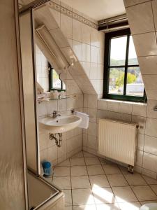 ห้องน้ำของ Hotel Stadt Olbernhau