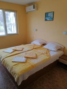 Ένα ή περισσότερα κρεβάτια σε δωμάτιο στο Villa Krisia Apartments