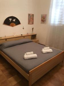 Posteľ alebo postele v izbe v ubytovaní Villetta Romeo Casavacanze