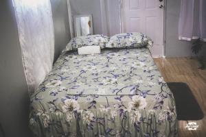 Katil atau katil-katil dalam bilik di Anthurium Apartment