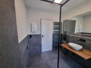A bathroom at Ferienwohnung Ströbitzer Wiesen