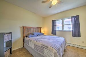 a bedroom with a bed and a ceiling fan at Bright Bingham Apt Hunt, ATV and River Raft! in Bingham
