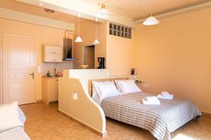 Postel nebo postele na pokoji v ubytování Sitia Old Port studio - 3min walk to beach - AC - WIFI