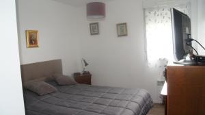 Posteľ alebo postele v izbe v ubytovaní appartement T2 résidence odyssée st Valéry en caux