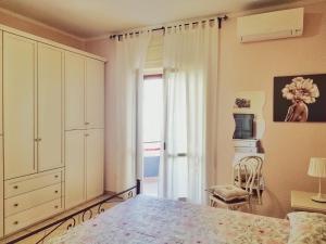 Postel nebo postele na pokoji v ubytování a CASA di CECY