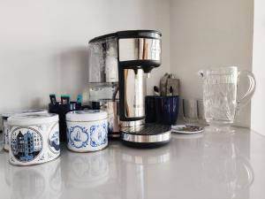 a coffee maker sitting on top of a counter at Allen Ridge in Hythe