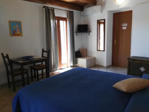 Postel nebo postele na pokoji v ubytování Cloris Guest House