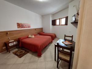 Postel nebo postele na pokoji v ubytování Cloris Guest House