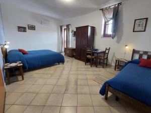 Postel nebo postele na pokoji v ubytování Cloris Guest House