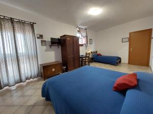 Postel nebo postele na pokoji v ubytování Cloris Guest House