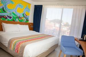 Postel nebo postele na pokoji v ubytování Best Western Arcachon Le Port