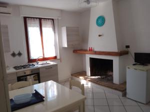 Kuchyň nebo kuchyňský kout v ubytování B & B dépendance