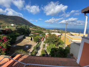 a view of the ocean from the balcony of a house at Fiordaliso - Holiday Housing in Lipari