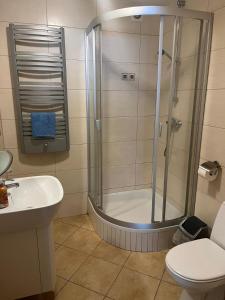 Kúpeľňa v ubytovaní Apartament Kredens , Willa Perla nad morzem