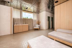 Postel nebo postele na pokoji v ubytování Nadmorski Dwór - Green Apartment